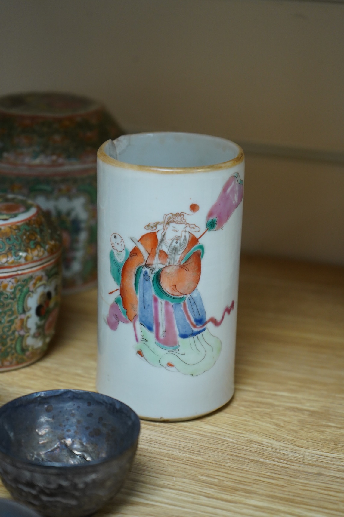 A collection of Chinese ceramics to include a blue and white mug, set of three graduated Canton jars and covers and two cylindrical brush washers